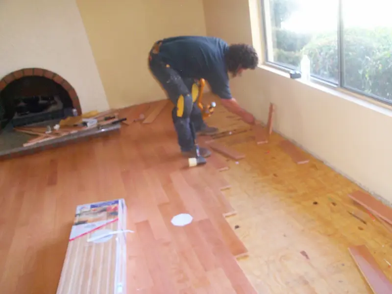 Hardwood flooring and travertine tile — project photograph by Kal Best Contractor
