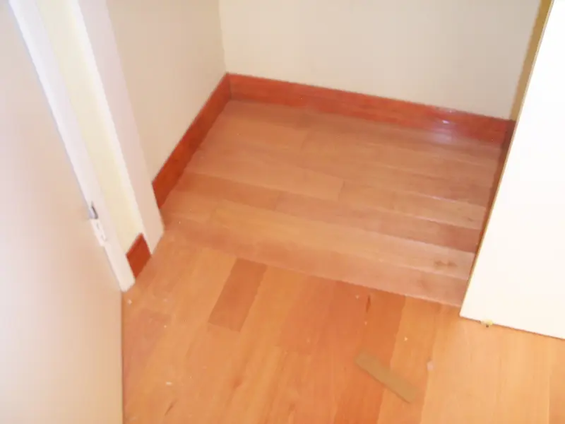 Hardwood flooring and travertine tile — project photograph by Kal Best Contractor