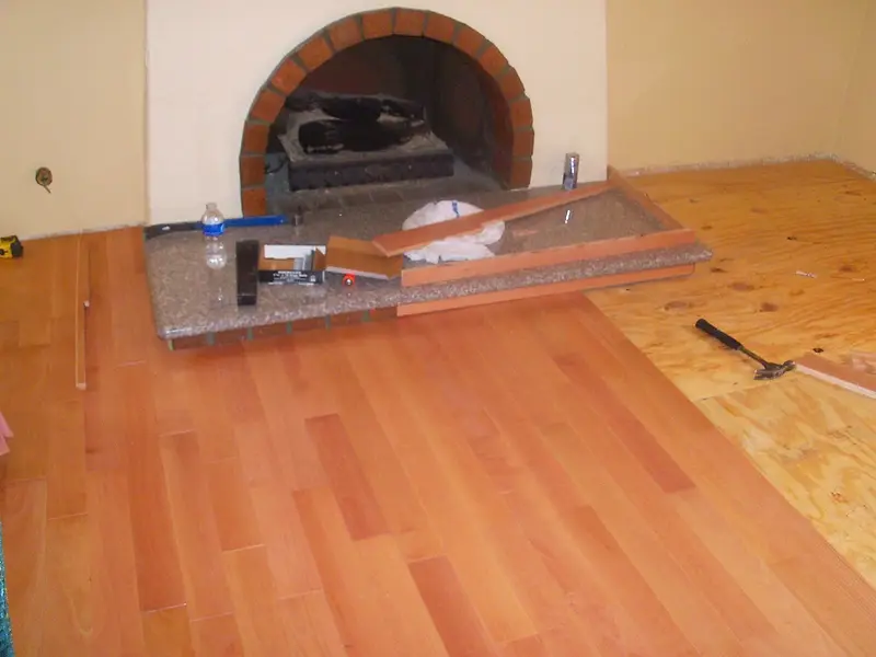 Hardwood flooring and travertine tile — project photograph by Kal Best Contractor
