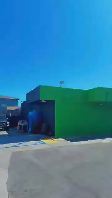 Still from a film of the completed exterior and sitework at La Bodega, Los Angeles